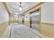 Hallway featuring elevators and neutral decor, ensuring convenient access to residential floors at 2405 W Serene Ave # 612, Las Vegas, NV 89123