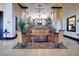 Elegant lobby with a grand staircase, seating area, and stylish decor, creating a welcoming entrance at 2405 W Serene Ave # 612, Las Vegas, NV 89123