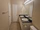Bathroom with double sinks, vanity, and neutral color scheme with tile flooring at 2900 Sunridge Heights Pkwy # 418, Henderson, NV 89052