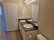 Bathroom with double sinks, vanity, and neutral color scheme with tile flooring at 2900 Sunridge Heights Pkwy # 418, Henderson, NV 89052