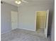 Bright bedroom featuring neutral carpeting, light gray walls, and closet space at 2900 Sunridge Heights Pkwy # 418, Henderson, NV 89052