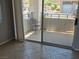 Cozy patio with outdoor seating and sliding glass doors, letting in natural light at 2900 Sunridge Heights Pkwy # 418, Henderson, NV 89052