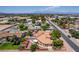 Overhead view of a home boasting a private backyard with pool and lovely landscaping, set in a peaceful neighborhood at 3085 Duneville St, Las Vegas, NV 89146