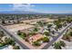 Wide aerial perspective of a home on a large lot with mature trees and landscaping, nestled in a quiet residential community at 3085 Duneville St, Las Vegas, NV 89146