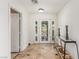 Bright entryway with tile flooring and French doors leading to the backyard and pool at 3085 Duneville St, Las Vegas, NV 89146