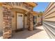 Inviting front entrance with stone pillars and a white door that adds character to the exterior at 3085 Duneville St, Las Vegas, NV 89146