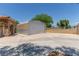View of the property's detached garage and its long driveway for additional parking at 3085 Duneville St, Las Vegas, NV 89146
