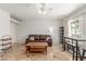 A stylish living room featuring a decorative wall, tile floors, and contemporary furniture at 3085 Duneville St, Las Vegas, NV 89146