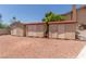 Backyard view of three storage sheds with neutral color, offering ample outdoor storage space and tidy organization at 3085 Duneville St, Las Vegas, NV 89146