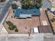A fenced-in property featuring a large lot with mature trees and partial shade at 3090 Westwind Rd, Las Vegas, NV 89146