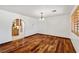 Dining area features hardwood floors, an arched doorway and a chandelier at 3090 Westwind Rd, Las Vegas, NV 89146