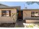 Close-up of house with desert landscaping, brick exterior, and unique house number design at 3090 Westwind Rd, Las Vegas, NV 89146
