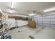 Spacious garage with storage cabinets and overhead lighting at 3090 Westwind Rd, Las Vegas, NV 89146
