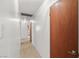 Clean hallway with neutral tones, leading to various rooms with easy access to the home's layout at 3090 Westwind Rd, Las Vegas, NV 89146