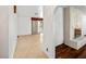 Spacious living room with tile flooring, a brick fireplace, and an open layout at 3090 Westwind Rd, Las Vegas, NV 89146