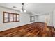 Spacious living area features hardwood floors, large windows and arched doorways at 3090 Westwind Rd, Las Vegas, NV 89146