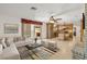 Inviting living room and kitchen area featuring an open floor plan and modern decor at 3090 Westwind Rd, Las Vegas, NV 89146
