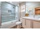Modern bathroom showcasing marble countertops and a glass-enclosed shower with stylish fixtures at 3101 Hayden Ct, Las Vegas, NV 89134