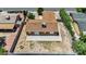 Aerial view of a spacious backyard with a concrete patio and potential for landscaping at 317 Kane Ave, Las Vegas, NV 89110
