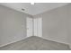 Bedroom with carpeted floors and a closet with sliding doors at 317 Kane Ave, Las Vegas, NV 89110