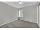 Bedroom with carpet flooring, and a closet with sliding doors at 317 Kane Ave, Las Vegas, NV 89110