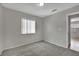 Bedroom with carpeted floors, natural light, and neutral wall color at 317 Kane Ave, Las Vegas, NV 89110