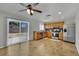 Spacious kitchen with tiled flooring, stainless steel appliances, and sliding door access to backyard at 317 Kane Ave, Las Vegas, NV 89110