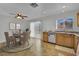 Eat-in kitchen featuring tile flooring and stainless steel appliances at 317 Kane Ave, Las Vegas, NV 89110