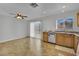 Kitchen area with tile flooring, stainless steel dishwasher and wood cabinets at 317 Kane Ave, Las Vegas, NV 89110