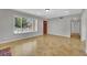 Bright living room with tile flooring, recessed lighting, and front door at 317 Kane Ave, Las Vegas, NV 89110