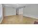 Open living room with tile flooring and recessed lighting at 317 Kane Ave, Las Vegas, NV 89110