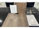 Interior finishes displaying paint and wood tones against dark marble countertop at 3723 Via Allegro, Henderson, NV 89044