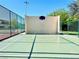 Outdoor basketball court featuring a new backboard, net and tennis courts in the background at 3785 Decade St, Las Vegas, NV 89121
