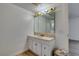 Bathroom vanity and sink with a large vanity mirror at 3785 Decade St, Las Vegas, NV 89121