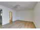 Bright bedroom featuring wood-look flooring and ceiling fan at 3785 Decade St, Las Vegas, NV 89121