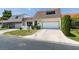 Charming home featuring well-maintained landscaping, a two-car garage, and a welcoming entrance at 3785 Decade St, Las Vegas, NV 89121