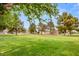 Lush green space with mature trees, offering a serene and peaceful environment within the community at 3785 Decade St, Las Vegas, NV 89121