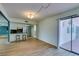 Eat-in kitchen with stainless steel appliances and adjacent patio at 3785 Decade St, Las Vegas, NV 89121