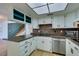 Modern kitchen boasts stainless appliances, sleek countertops, and ample cabinet space at 3785 Decade St, Las Vegas, NV 89121