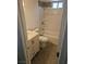 Neat bathroom featuring modern white fixtures and tiled floors, creating a clean and functional space at 3911 Torsby Pl, Las Vegas, NV 89119