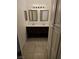 Bathroom featuring double sink vanity, framed mirrors, tiled floor, and storage cabinet at 3911 Torsby Pl, Las Vegas, NV 89119