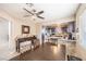 Cozy dining area featuring a dark wood table and a view into the modernized kitchen at 433 Jubilation Dr, Las Vegas, NV 89145