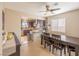 Open kitchen and dining area features modern appliances, stylish finishes, and comfortable seating, ideal for everyday meals and gatherings at 433 Jubilation Dr, Las Vegas, NV 89145