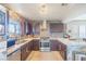 Well-equipped kitchen with stainless steel appliances, granite countertops, and ample cabinetry, perfect for cooking and entertaining at 433 Jubilation Dr, Las Vegas, NV 89145