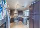 Modern kitchen with stainless steel appliances, granite countertops, and stylish backsplash, offering a functional and appealing space at 433 Jubilation Dr, Las Vegas, NV 89145