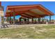 A covered pavilion with picnic tables offers shaded space for community events at 4533 Queens Hill St, North Las Vegas, NV 89031