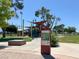 Craig Ranch Regional Park map and play structures on a clear day under scattered trees at 4533 Queens Hill St, North Las Vegas, NV 89031