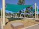 Outdoor recreation with shaded swingset and a view of the playground for endless hours of fun and entertainment at 4533 Queens Hill St, North Las Vegas, NV 89031
