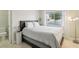Cozy bedroom featuring a comfortable bed and bright window at 4753 Carefree Dr, Las Vegas, NV 89122