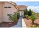 Charming home exterior featuring well-maintained landscaping and a welcoming entrance at 4753 Carefree Dr, Las Vegas, NV 89122